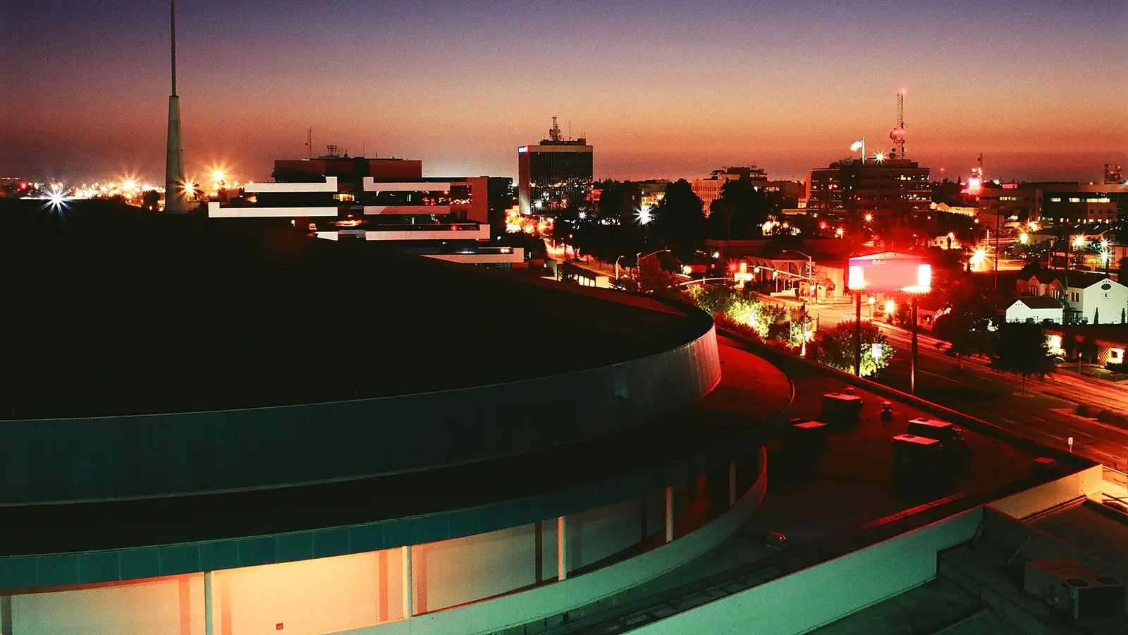 Bakersfield skyline at night with the Rabobank Arena in the foreground.